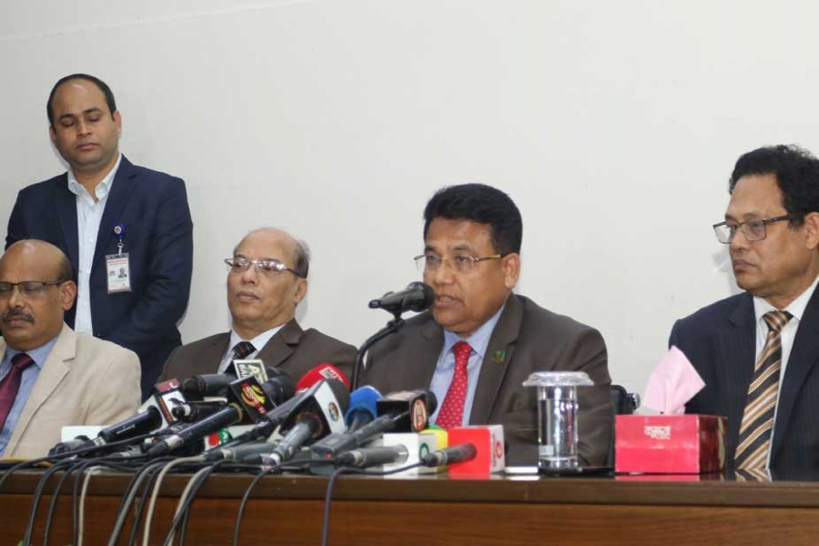 EC Secretary Helal Uddin Ahmed speaking at a press briefing at Nirbachan Bhaban in the capital on Sunday - UNB