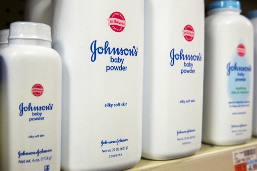 Bottles of Johnson & Johnson baby powder line a drugstore shelf in New York October 15, 2015. Reuters/Files