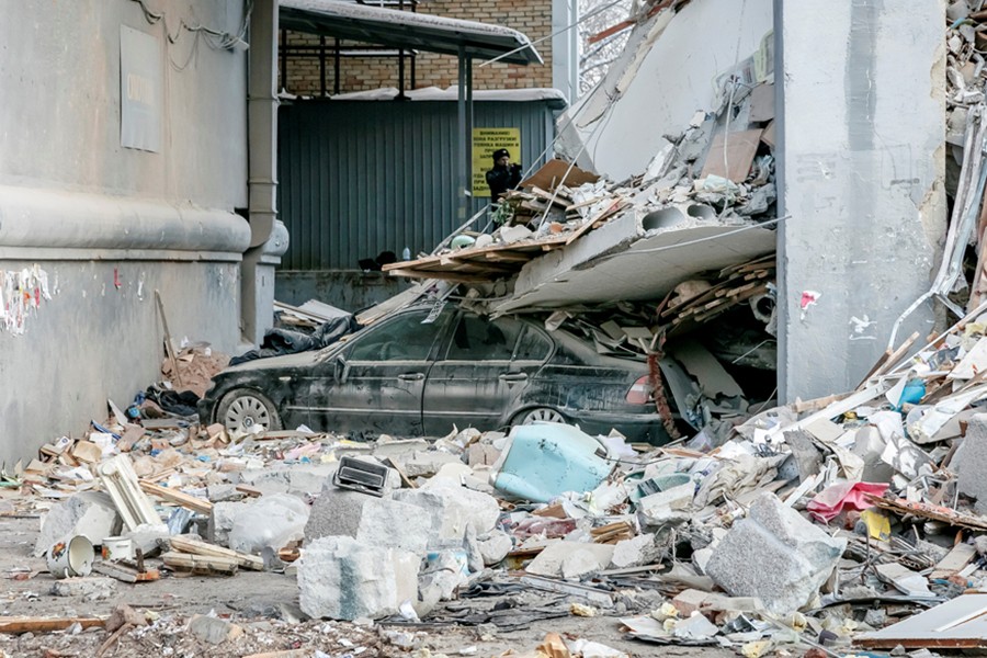 A damaged car is seen at a site of a partially collapsed apartment block in Magnitogorsk, Russia — Reuters photo