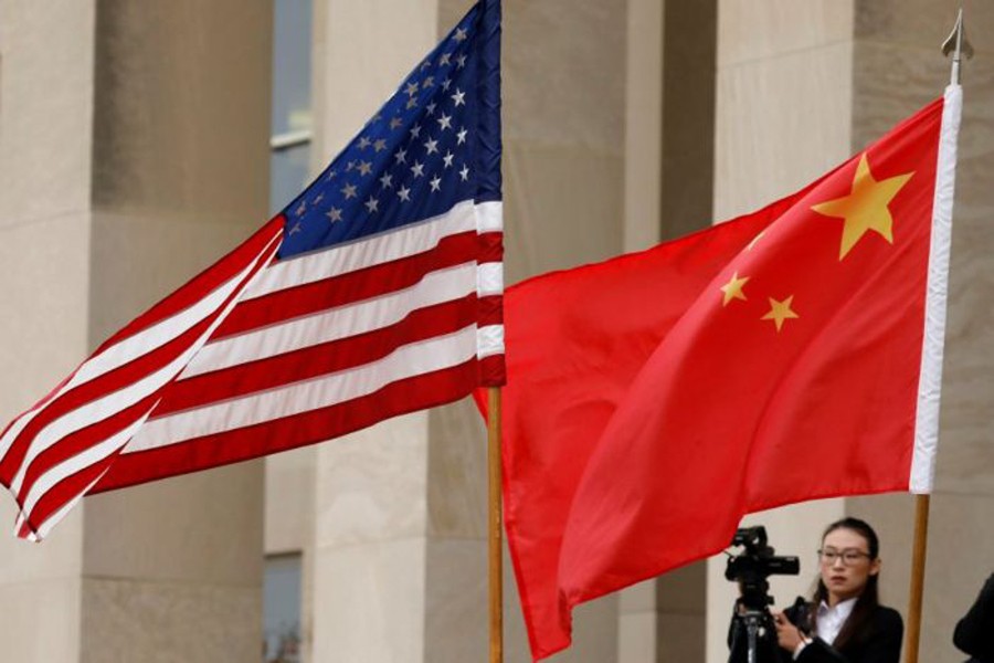 US and Chinese flags are seen before Defense Secretary James Mattis welcomes Chinese Minister of National Defense Gen. Wei Fenghe to the Pentagon in Arlington, Virginia, US, November 9, 2018. Reuters/Files