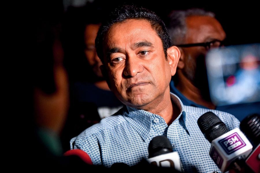 MALÉ: Maldives' former president Abdulla Yameen speaking to the media outside a police station where he had been questioned by investigators on money laundering allegations in Male on Tuesday      --AFP