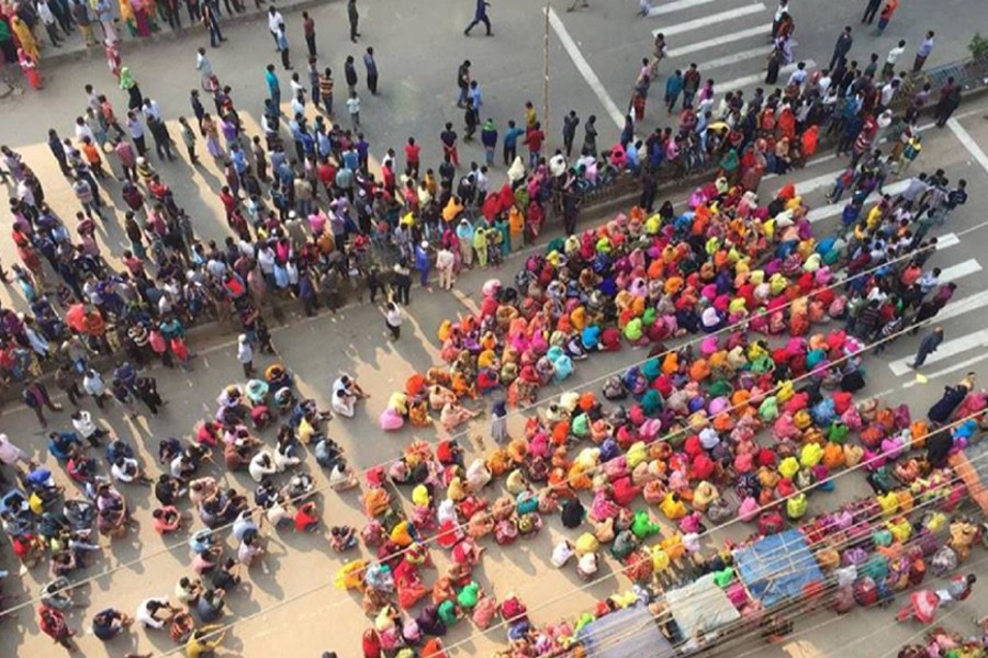 Representational image: A view of ready-made garment workers taking to streets in Dhaka city on Thursday