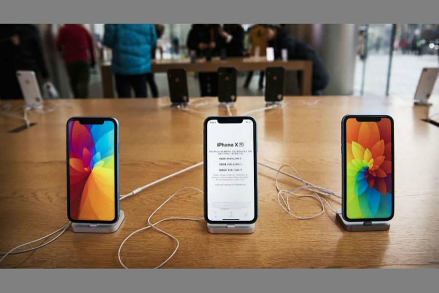 The flagship iPhone product earns Apple about two-thirds of its revenue, and allows the company to generate more money from attached products like Apple Watches, AirPods, and services like Apple Music. Image: Bloomberg