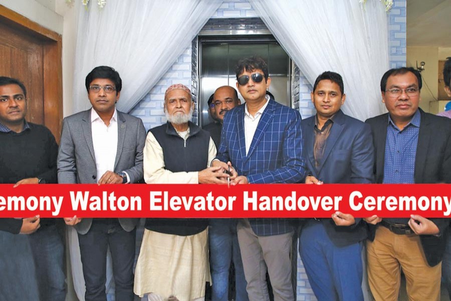 Film actor Amin Khan, head of brand development department of Walton Group, handing over an elevator of 300 kg capacity to Syed Mustafizur Rahman at his residence at Uttara in Dhaka recently