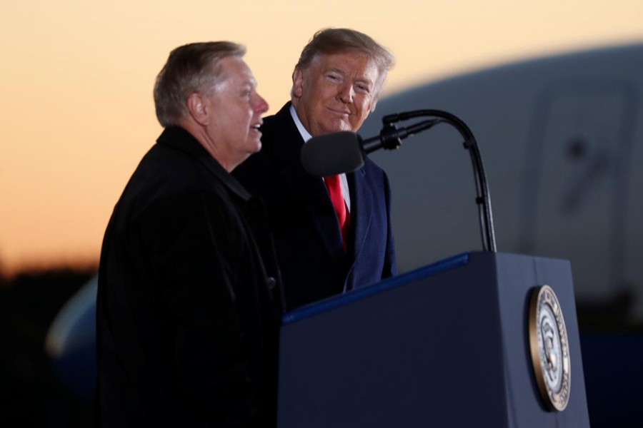 US President Donald Trump listens to US Senator Lindsey Graham (R-SC) speak during a campaign rally for Republican US Senator Cindy Hyde-Smith in Tupelo, Mississippi, US, November 26, 2018. Reuters/Files