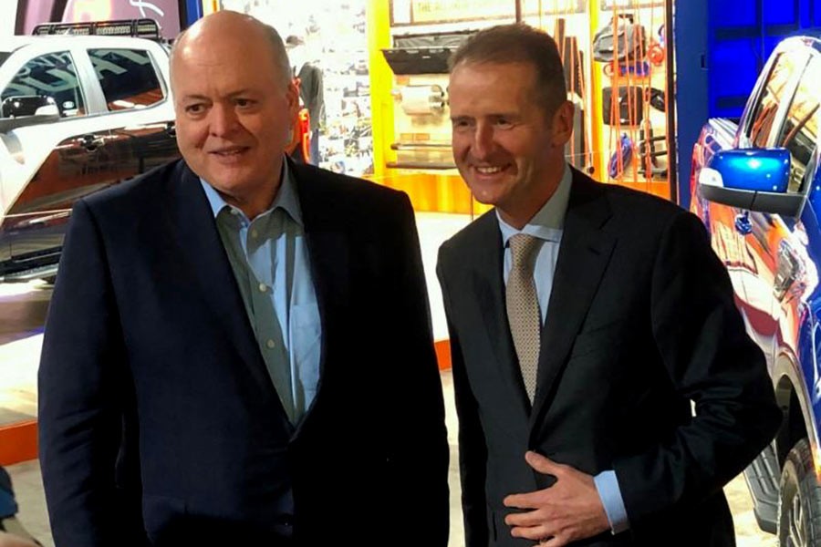 The President and CEO of Ford Motor Company Jim Hackett, posing with Volkswagen CEO Herbert Diess at the North American International Auto Show in Detroit of Michigan. -Reuters Photo