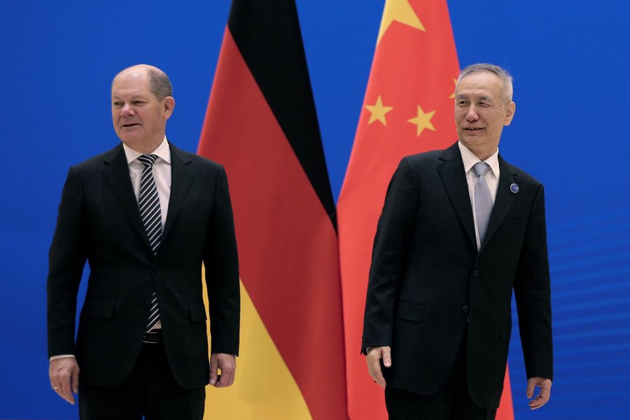 German Finance Minister Olaf Scholz, left, and Chinese Vice Premier Liu He arrive for the China-Germany High Level Financial Dialogue at the Diaoyutai State Guesthouse in Beijing, Friday, January 18, 2019. Reuters