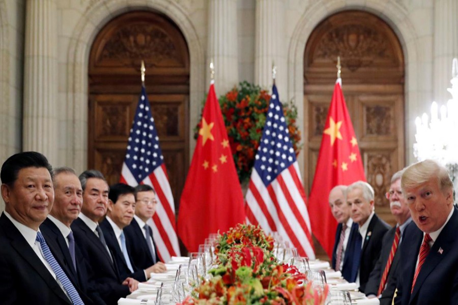 US President Donald Trump, US Secretary of State Mike Pompeo, US President Donald Trump's national security adviser John Bolton and Chinese President Xi Jinping attend a working dinner after the G20 leaders summit in Buenos Aires, Argentina, December 1, 2018. Reuters/Files