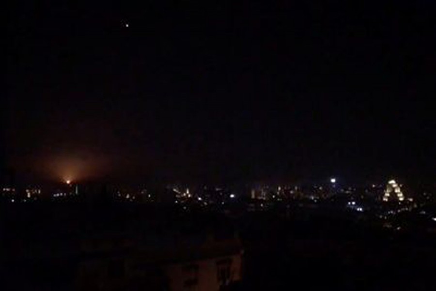 What is believed to be guided missiles are seen in the sky during what is reported to be an attack in Damascus, Syria, January 21, 2019, in this still image taken from a video obtained from social media. Facebook Diary of a Mortar Shell in Damascus/Youmiyat Qadifat Hawun fi Damashq/via Reuters