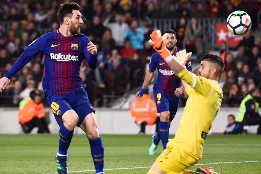 Messi comes off bench to inspire Barca win