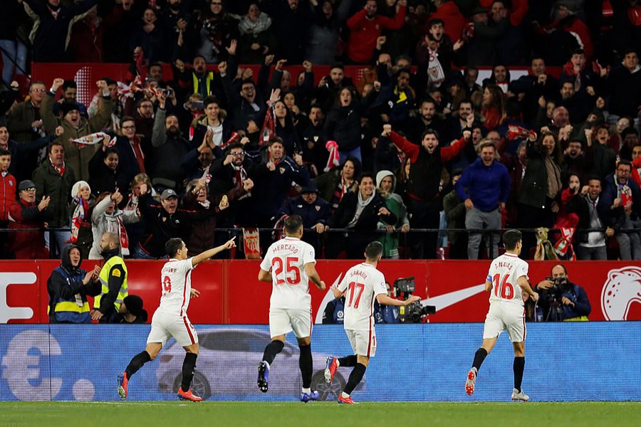 Pablo Sarabia of Sevilla (second from right) celebrates with the teammates after opening the scoring for his side against Barcelona — Reuters photo