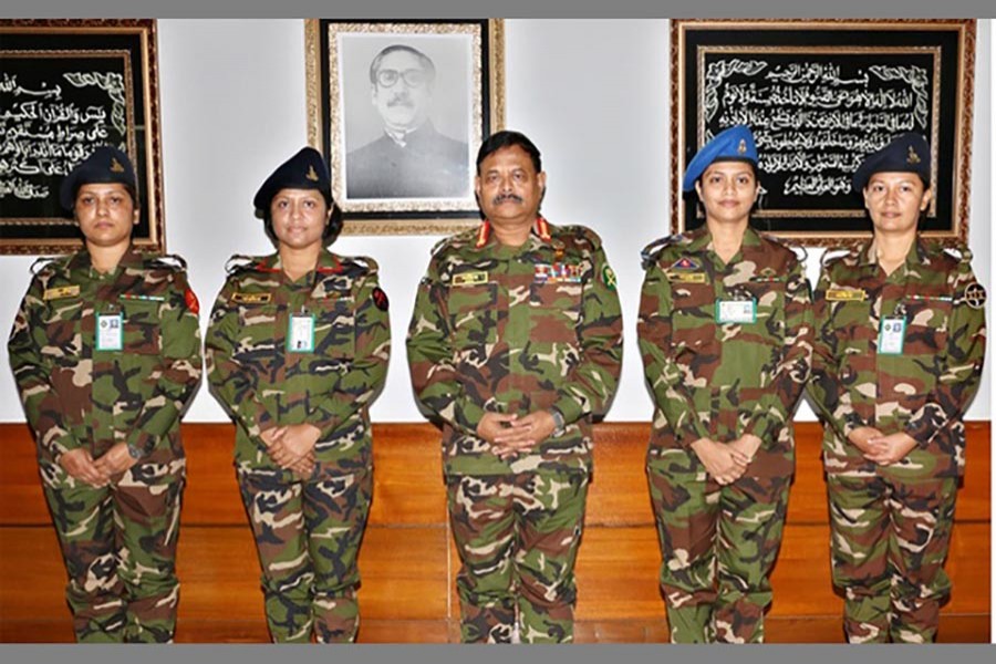 Army Chief General Aziz Ahmed seen with four women officers who were promoted to the rank of Lt Col at the Army Headquarters in Dhaka on Thursday. Photo: ISPR