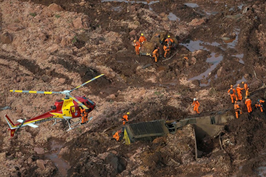 Rescue crew work in a tailings dam owned by Brazilian miner Vale SA that burst, in Brumadinho, Brazil on Friday — Reuters photo