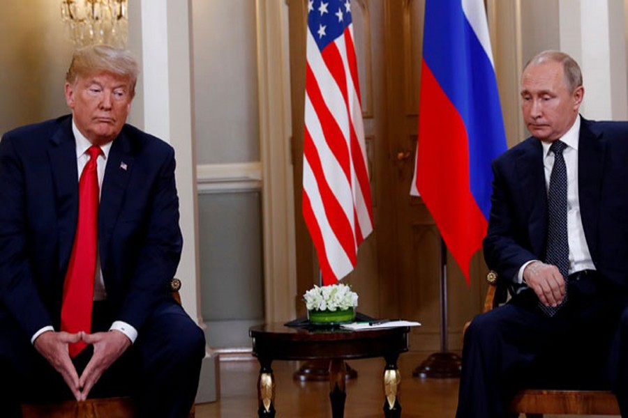 US President Donald Trump meets with Russian President Vladimir Putin in Helsinki, Finland, July 16, 2018. Reuters photographer Kevin Lamarque: "Body language can give an ordinary photo much more meaning, and here, Trump and Putin did not disappoint." Reuters/Kevin Lamarque/File Photo