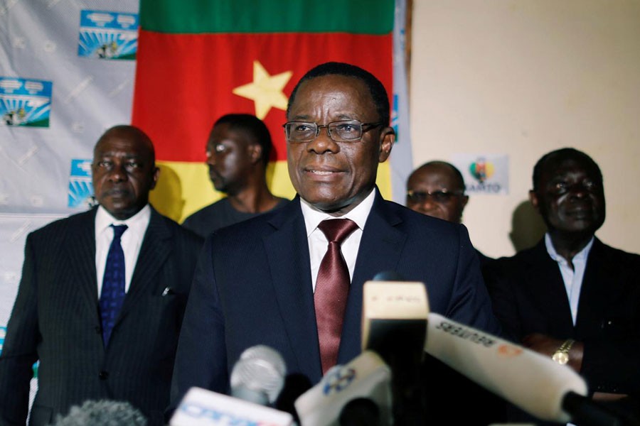 Maurice Kamto, a presidential candidate of Renaissance Movement (MRC), reacts as he holds a news conference at his headquarter in Yaounde, Cameroon October 8, 2018 - REUTERS/Zohra Bensemra/File Photo