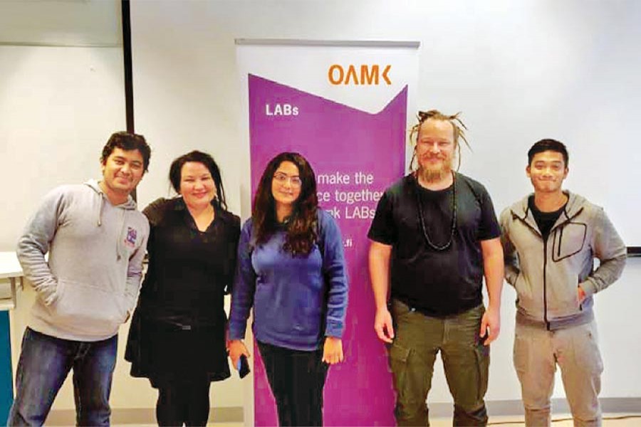 The students of the exchange programme (extreme left, extreme right, and centre) with their labmasters Ulla Maija (second from left) and Janne Karjalainen (second from right)