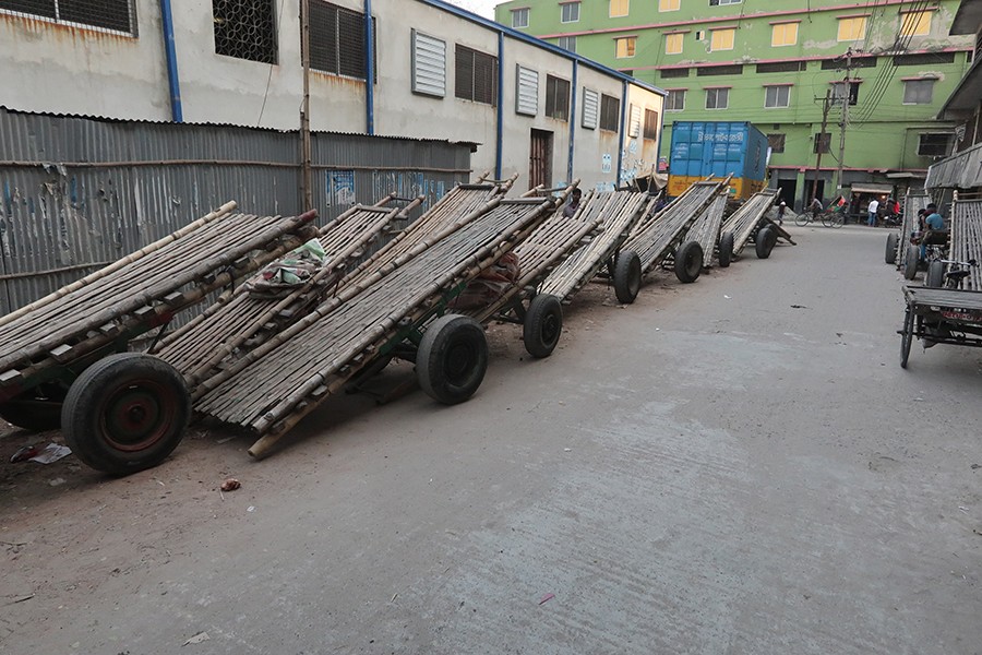 Pushcarts lying idle at the old Hazaribagh tannery hub in the city on Thursday in the absence of work after most of the major factories were shifted to the Savar tannery estate — FE photo