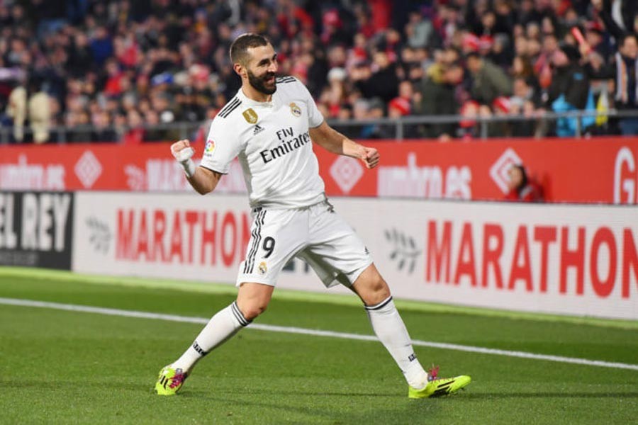 Real Madrid's Karim Benzema celebrating after scoring during the Copa del Rey quarterfinal match against Girona at Montilivi Stadium on Thursday	— Internet