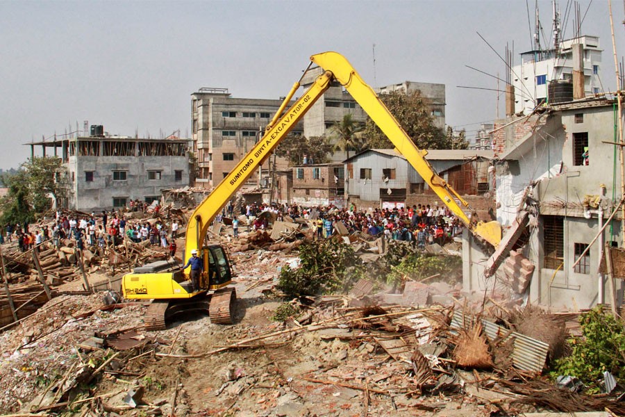 Some 200 illegal establishments, including a three-story building, were demolished at Nabanchar on the first day of the drive on Tuesday - Focus Bangla photo