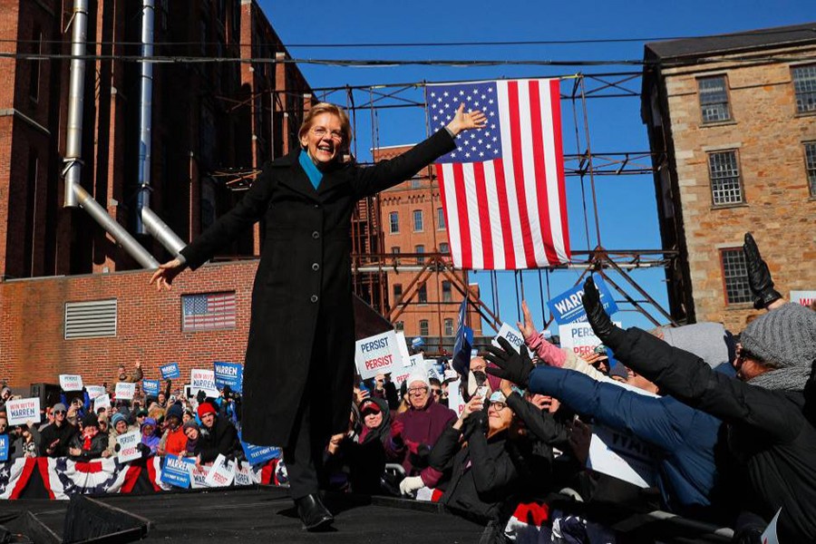 Potential 2020 Democratic presidential nomination candidate US Senator Elizabeth Warren (D-MA) waves at the crowd ahead of a campaign rally in Lawrence, Massachusetts, US on Saturday — Reuters