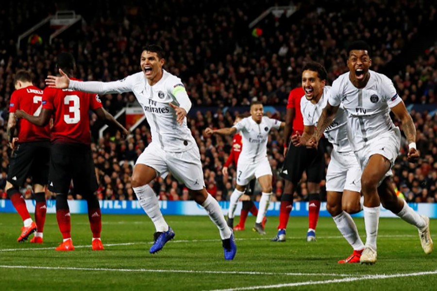 Paris St Germain's Presnel Kimpembe celebrates scoring their first goal with Thiago Silva and Marquinhos — Reuters action image