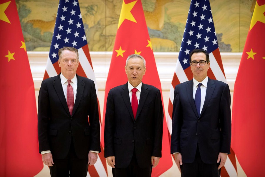 US Treasury Secretary Steven Mnuchin, second from left, US Trade Representative Robert Lighthizer, third from left, and Chinese Vice Premier and lead trade negotiator Liu He, second from right, pose for a photo before the opening session of trade negotiations at the Diaoyutai State Guesthouse in Beijing, Thursday, February 14, 2019. Reuters