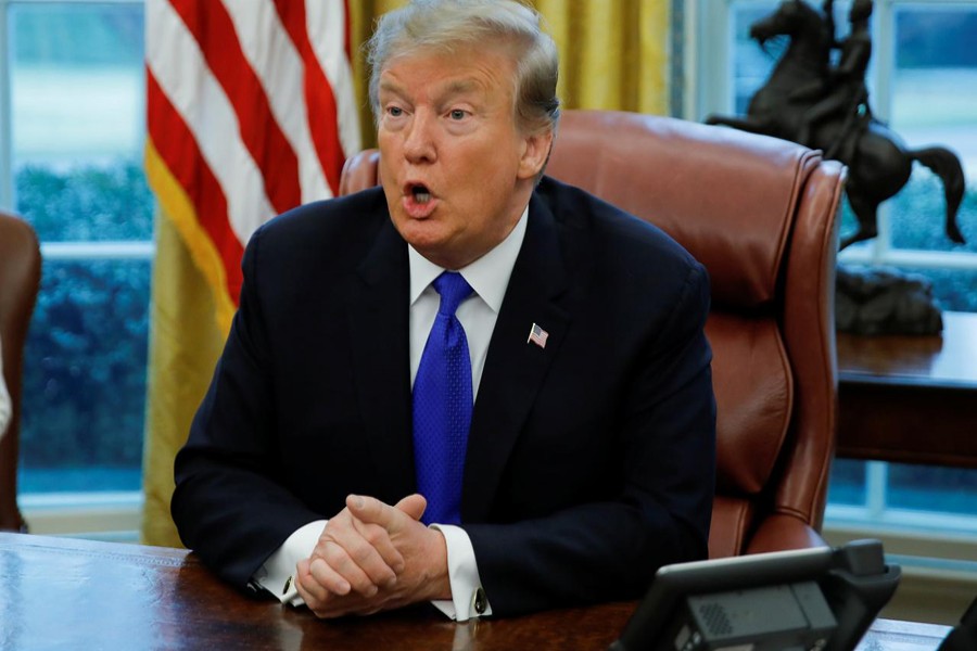 US President Donald Trump looks on during a meeting with China's Vice Premier Liu He in the Oval Office at the White House in Washington, US, February 22, 2019. Reuters