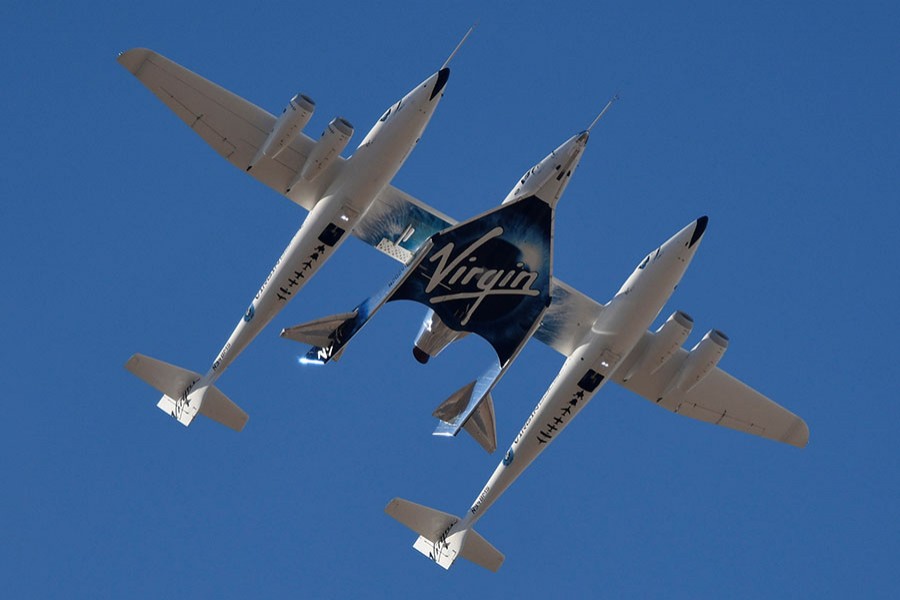 Virgin Galactic rocket plane, the WhiteKnightTwo carrier plane, with SpaceShipTwo passenger craft takes off from Mojave Air and Space Port in Mojave, California, US, February 22, 2019. Reuters