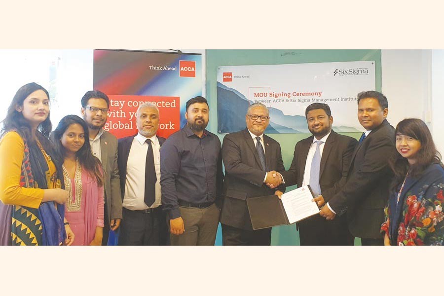 Head of ACCA Bangladesh Md Ahsanul Hoque Bashar and SSMI Asia - Bangladesh Vice President Sadique Salim exchanging documents after signing the MoU on behalf of their respective organisations in the city recently