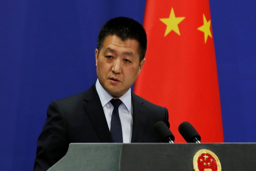 Chinese Foreign Ministry spokesman Lu Kang answers questions about a major bus accident in North Korea, during a news conference in Beijing, China, April 23, 2018. Reuters/Files