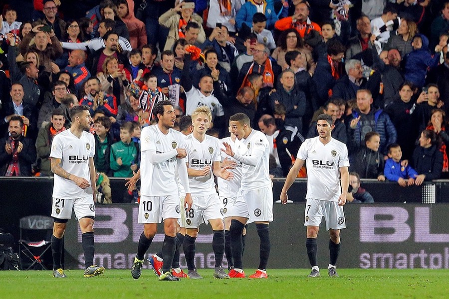 Valencia's Rodrigo Moreno celebrates his goal with the teammates that helps his side see off Real Betis — Reuters photo