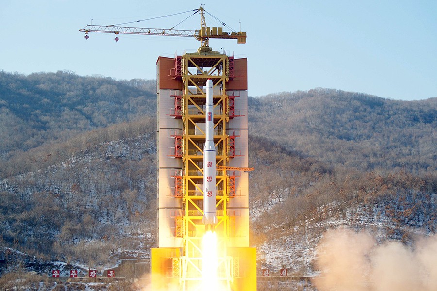 A North Korean long-range rocket is launched into the air at the Sohae rocket launch site, North Korea, in this photo released by Kyodo on February 7, 2016 — Kyodo handout via Reuters