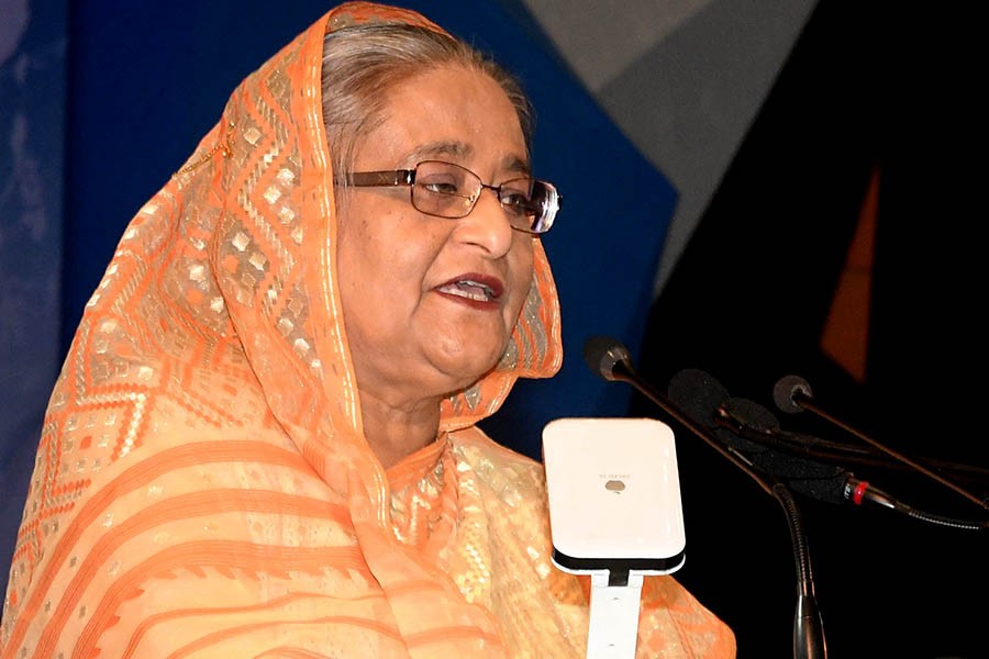 Prime Minister Sheikh Hasina seen addressing a programme in this undated Focus Bangla photo