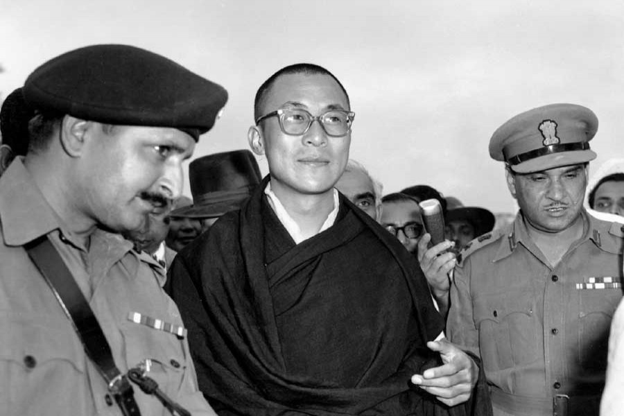 In this April 18, 1959, file photo, Tibetan spiritual leader the Dalai Lama, centre, arrives at Tezpur, Assam in India.  – AP