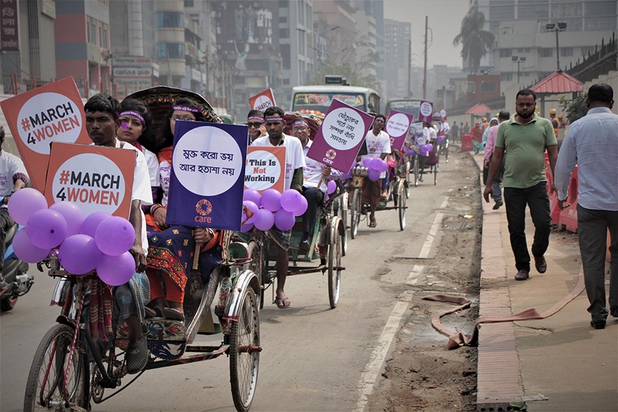 CARE Bangladesh organises rickshaw rally to mark Women’s Day