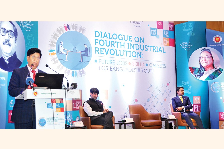 Foreign Minister AK Abdul Momen delivering a speech at a dialogue on 'Fourth Industrial Revolution: Future jobs - skills - careers for Bangladeshi youth' at a city hotel on Tuesday	 — Photo PID