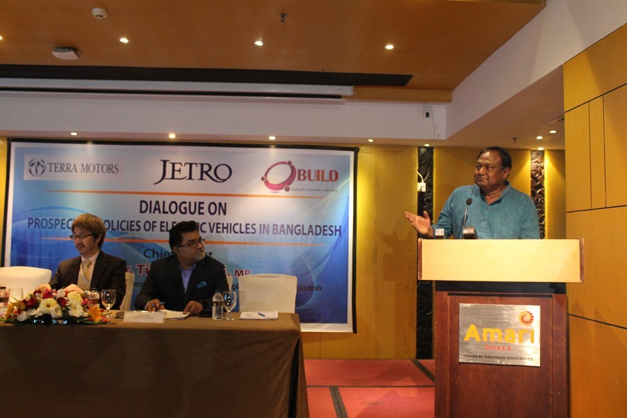 Commerce Minister Tipu Munshi speaking as the chief guest at a dialogue on 'Prospects and Policies of Electric Vehicles in Bangladesh', jointly organised by JETRO and BUILD in the city on Wednesday — FE photo