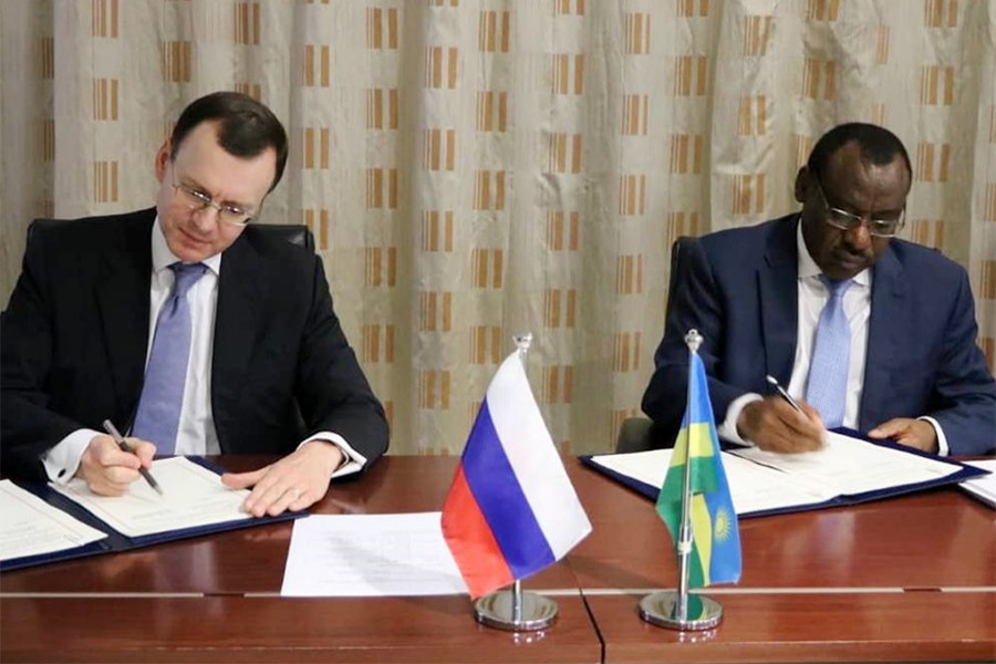 Nikolay Spassky (L), Rosatom Deputy Director General for International Relations and Claver Gatete, Rwandan Minister of Infrastructure signing MoUs for co-operation in peaceful use of nuclear energy in the Rwandan capital Kigali recently.