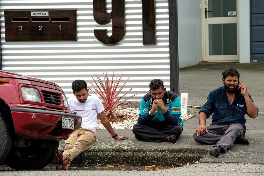 Grieving members of the public following a shooting at the Al Noor mosque in Christchurch, New Zealand on March 15, 2019 — Reuters photo