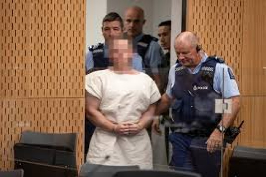 Brenton Tarrant, charged for murder in relation to the mosque attacks, is led into the dock for his appearance in the Christchurch District Court, New Zealand, March 16, 2019. Reuters