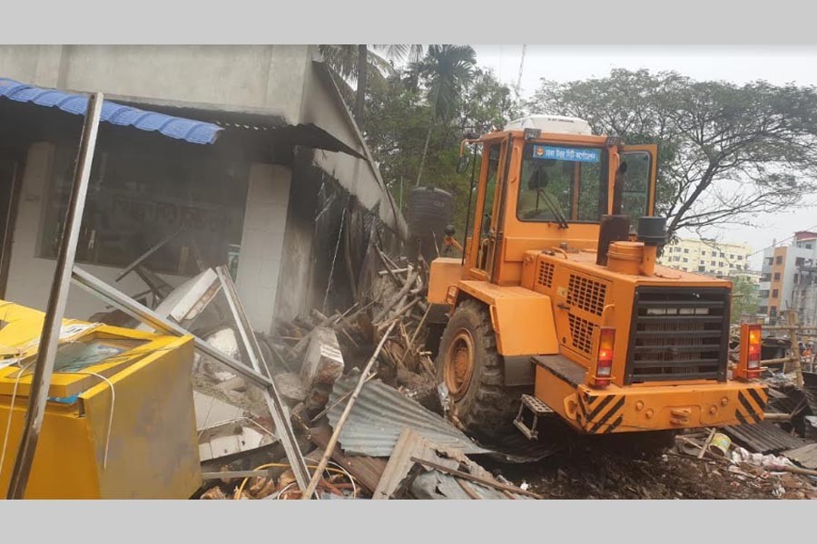 DNCC removes illegal structures to solve water-logging problems