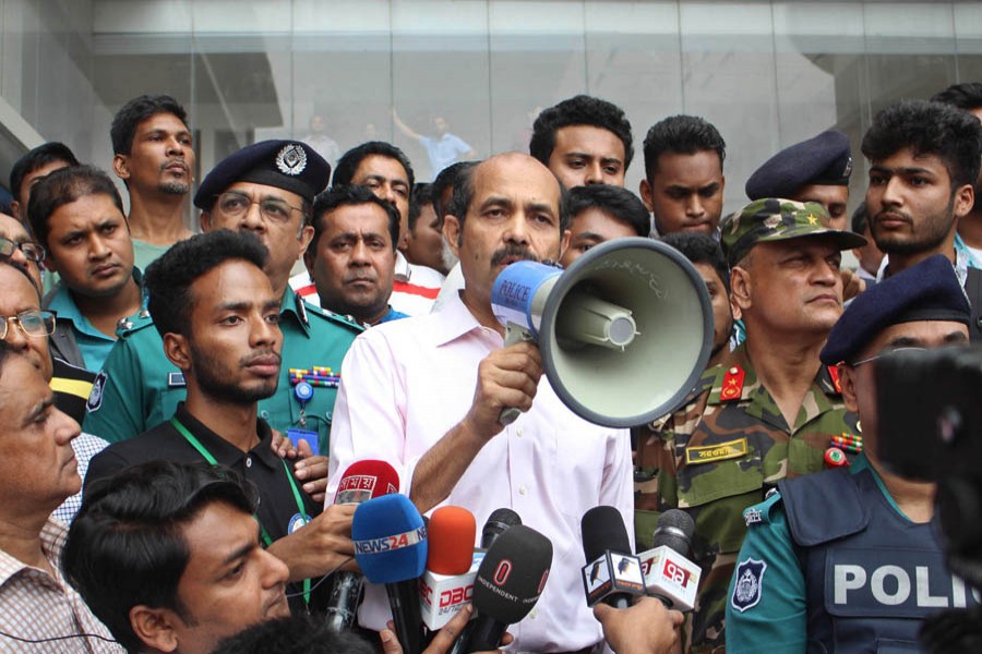 Dhaka North City Corporation Mayor Atiqul Islam request the protesters, who have blocked the road in front of Jamuna Future Park in Dhaka city following the death of a student this day morning, to withdraw the blockade, promising to meet their demands, including ensuring punishment for the driver responsible for the accident. Photo: Focus Bangla