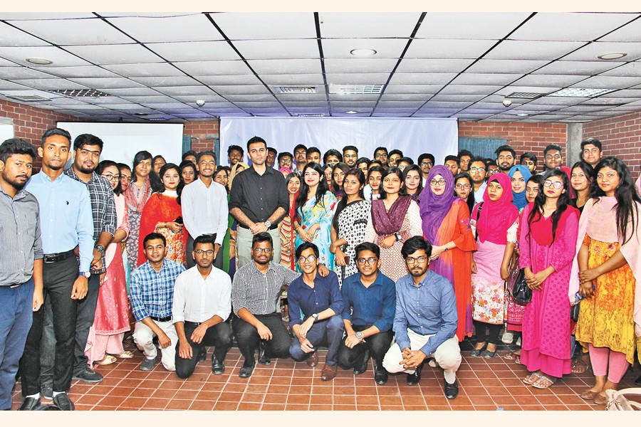 Participants with organisers and guests after the CV writing workshop of Career Clinic 2019 held at East West University