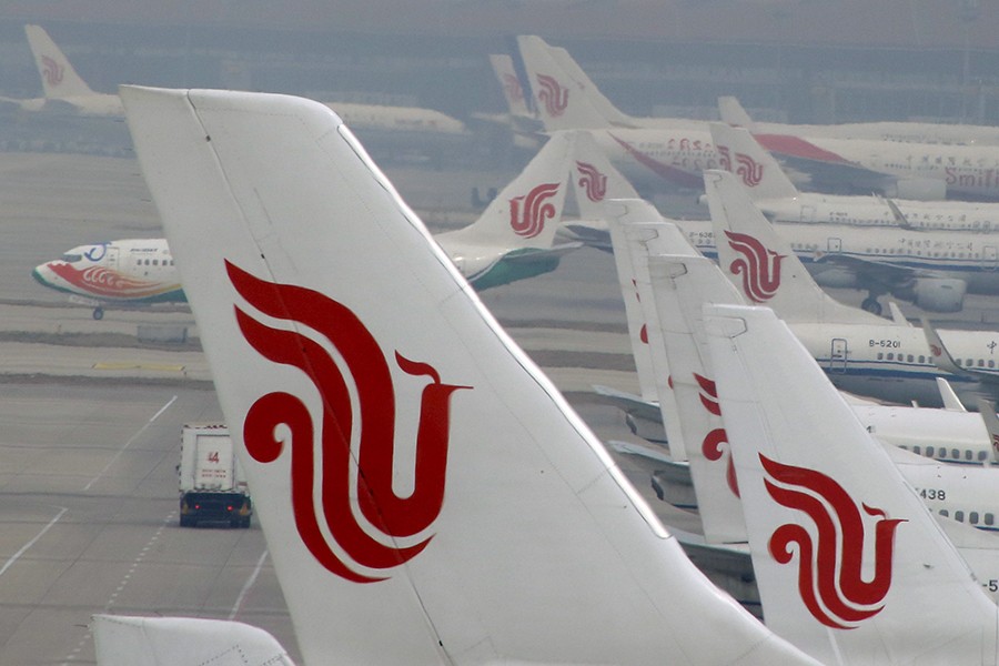 Flights of Air China are parked on the tarmac of sn airport in Beijing, China on March 28, 2016 — Reuters photo used only for representation