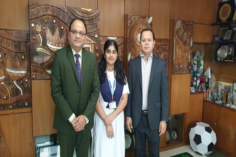 Swastika Gargi Chakraborty (middle) with her father Supriya Kumar Chakraborty (left) and Md. Sabur Khan (right), the Chairman of Daffodil International University (DIU)