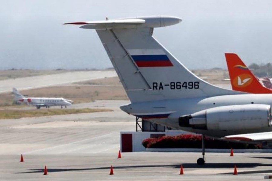 An airplane with the Russian flag is seen at Simon Bolivar International Airport in Caracas, Venezuela on March 24, 2019 — Reuters photo