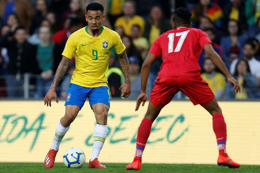 Soccer Football - International Friendly - Brazil v Panama - Estadio do Dragao, Porto, Portugal - March 23, 2019 Brazil's Gabriel Jesus in action with Panama's Cesar Blackman - REUTERS/Pedro Nunes