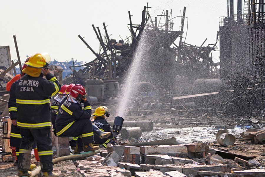 Firefighters work on the rubble of a pesticide plant owned by Jiangsu Tianjiayi Chemical following an explosion in Xiangshui county, Yancheng, Jiangsu province, last week - Photo: Reuters