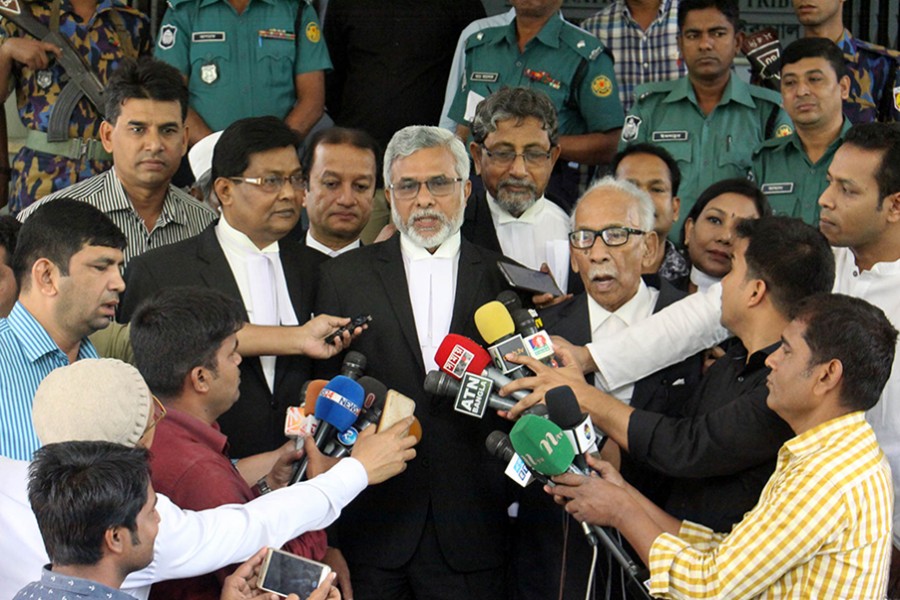 Mokhlesur Rahman Badal, one of the state prosecutors in the case, speaks to the reporters following the verdict at the International Crimes Tribunal — Focus Bangla photo