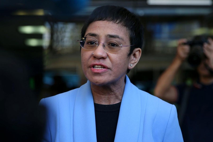 Maria Ressa, an executive of online news platform Rappler, speaks to the media after posting bail for tax evasion charges at Regional Trial Court Branch 265 in Pasig City, Metro Manila, in Philippines, December 3, 2018 - REUTERS/Eloisa Lopez